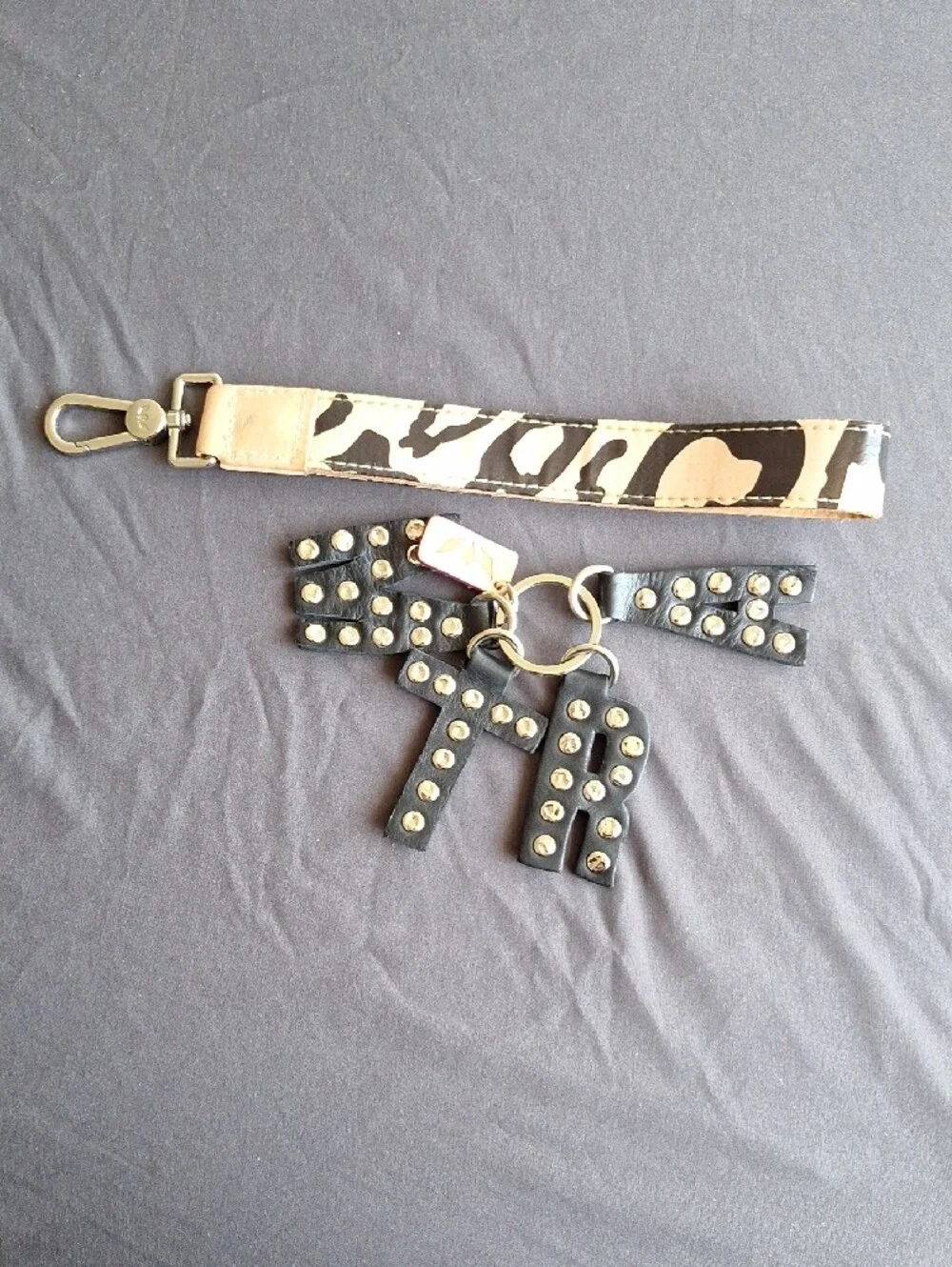 Consuela MTRA Black Studded Letter Bag Charm with Wrist Strap